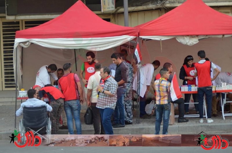 منظمة داري مستمرة بإسعاف المتظاهرين بساحة التحرير رغم منعها أمنيا